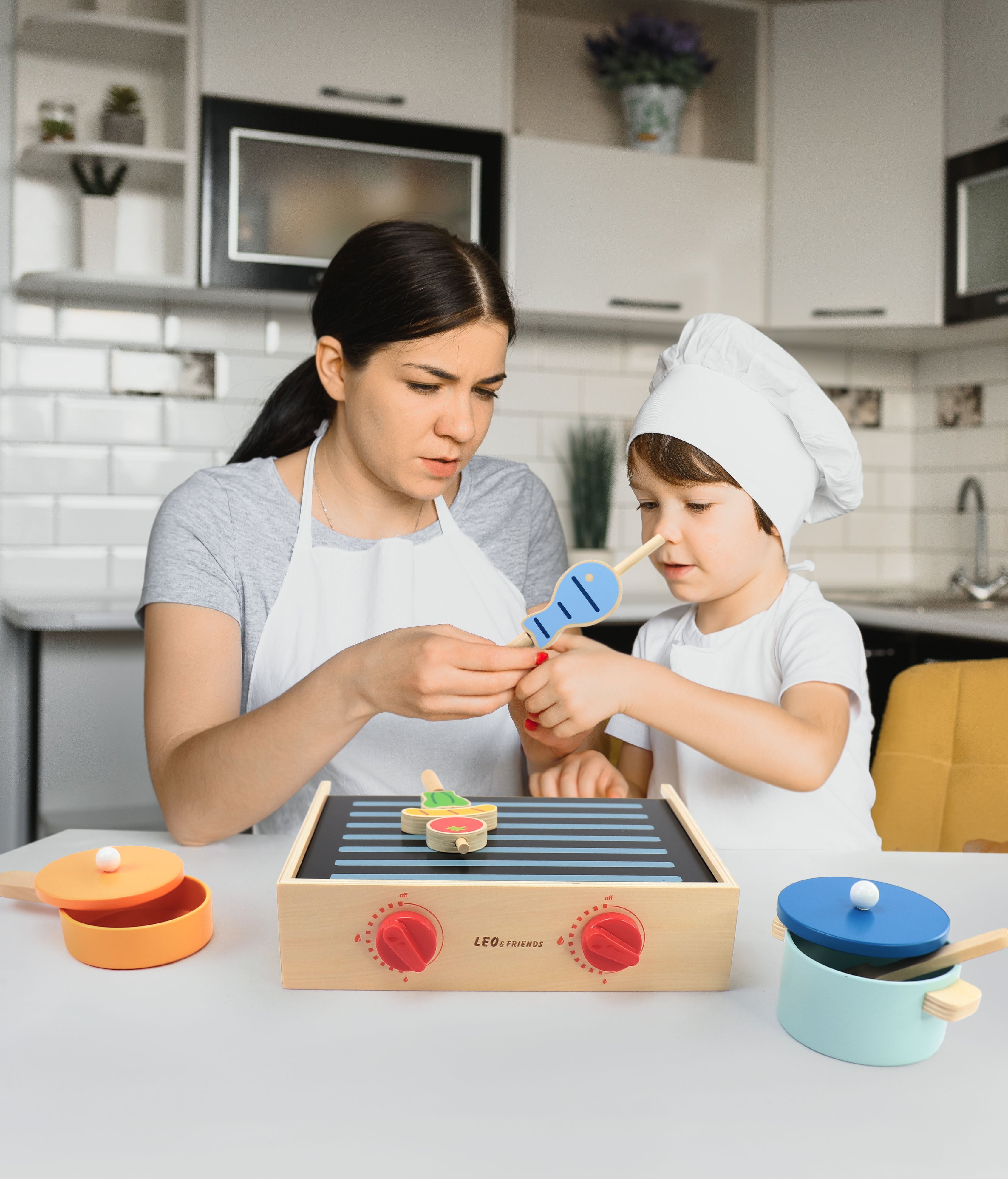 2-in-1 Mini Kitchen Wooden Play Set with 15-Pieces Included | Play-Pretend Cooking Stovetop, Pants, Spatulas, BBQ Accessories | Interactive, Educational Cooking Set for Ages 24-Months and Older