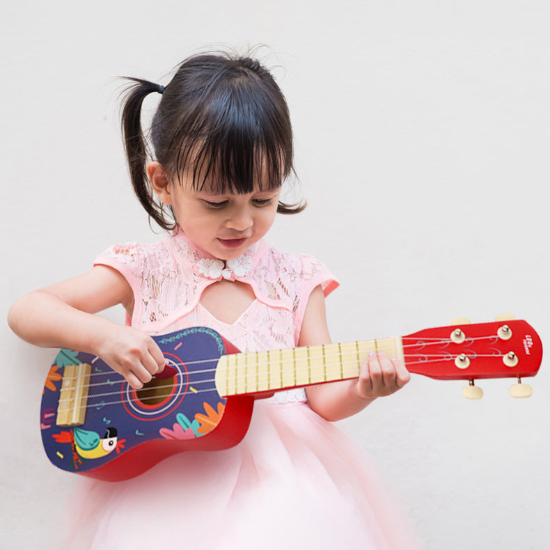Leo & Friends Wooden Ukulele for Toddlers | Made with Non-Toxic Wood, Colorful Red & Purple Design with Parrots | Perfect Educational Music Toy for Girls and Boys, Includes Strings for Strumming
