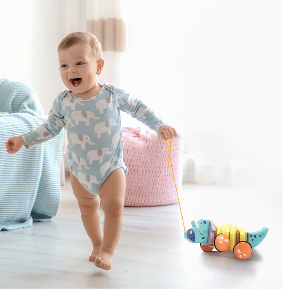 Leo & Friends Pull Along Walking Triceratops Wooden Toy for Boys and Girls | Flexible Dino Walk Along Toy, Pushes and Pulls | Rubbed Rimmed Wheels for Educational Fun, Perfect Birthday or Holiday Gift